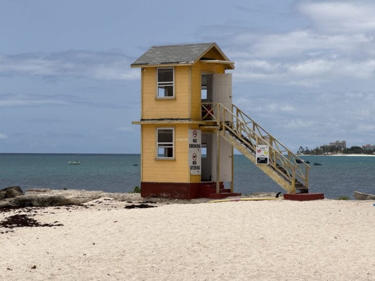 Yellow lifeguard tower on the sand at Miami Enterprise Beach, Barbados